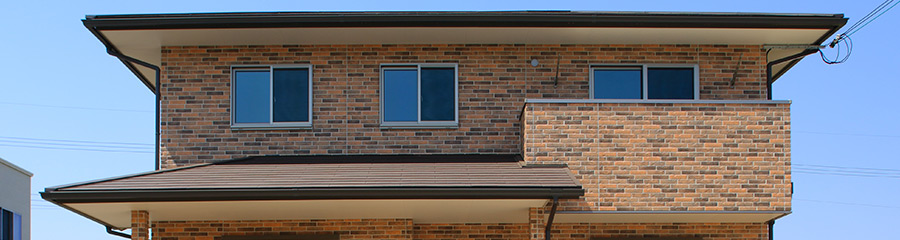 四季を愉しむレンガ調の住宅